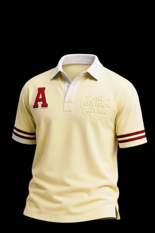 Cream rugby polo shirt with red and white accents and a chenille patch 'A' on a black background
